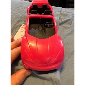Pink convertible sports car black interior Barbie size